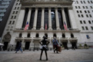 Picture of Wall Street ends down as jittery investors await Fed report