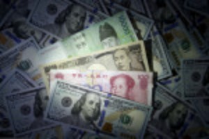 Picture of Investors trim long positions on Asian currencies, yuan bets halved