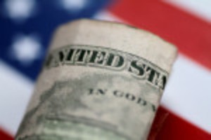 Picture of Dollar slips as U.S. consumer spending stagnates