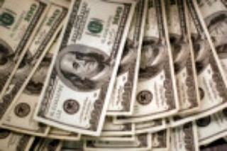 Dollar bides time below two-month highs before payrolls test