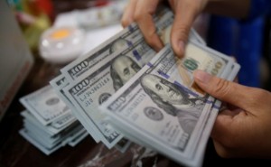 Picture of Dollar Up, Boosted by Plunge in Chinese Shares and Caution Ahead of Fed Decision