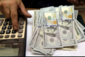 Picture of Dollar index edges up on upbeat data; virus worries linger