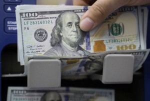 Picture of Dollar stands tall before Fed minutes; kiwi volatile