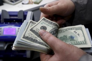 Picture of Dollar Up, Continues Upward Trend as Fed Taper Remains in Question