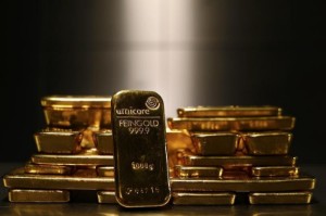 Picture of Gold up Most in 5 Days as Treasurys Dip, Oil Surges and Stocks Fall