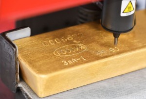 Picture of Gold hits 2-month low as rallying dollar saps demand