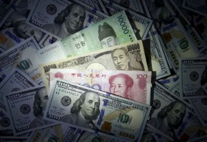 Ảnh của Asia FX bears hit record high on hawkish Fed, China growth worries: Reuters poll