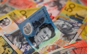 Picture of Aussie, kiwi sink as China's recovery falters; yuan eases on surprise rate cut