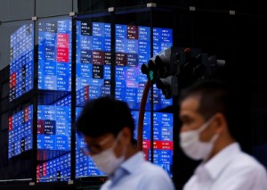 Picture of Asia shares mixed, China cuts rates as data disappoints