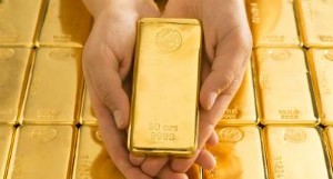 Ảnh của Vàng thế giới giảm hơn 1% khi đồng USD phục hồi