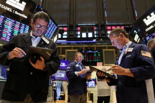 Wall St opens higher on tech boost