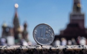 Picture of Russian rouble edges lower as month-end tax support passes
