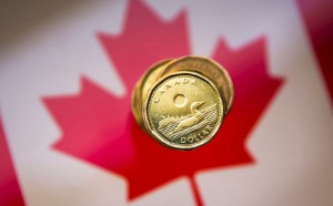Picture of Canadian dollar forecasts cut as BoC trails Fed on peak-rate bets - Reuters poll