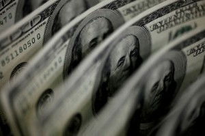 Picture of Dollar edges up in range-bound holiday markets