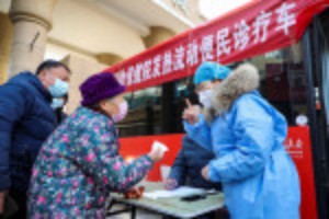 Picture of Beijing, Shanghai residents back to work as China eases into living with COVID