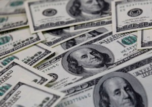 Picture of Dollar tumbles after U.S. jobs report, service sector contraction