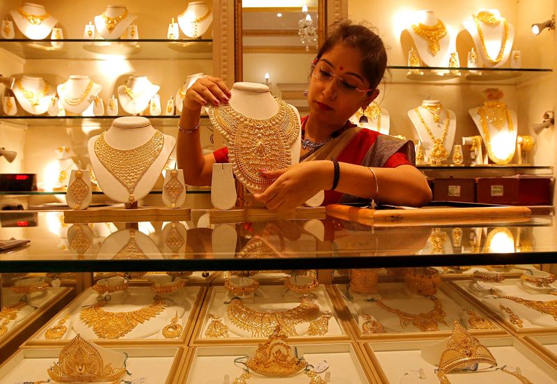 Gold bounces as dollar retreats after U.S. inflation data