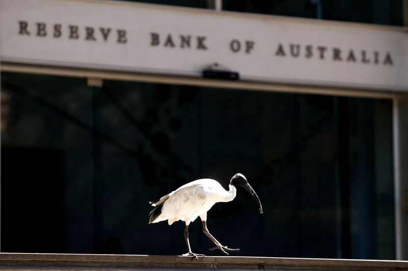 Australia's central bank warns inflation too high, 'decisive' action needed