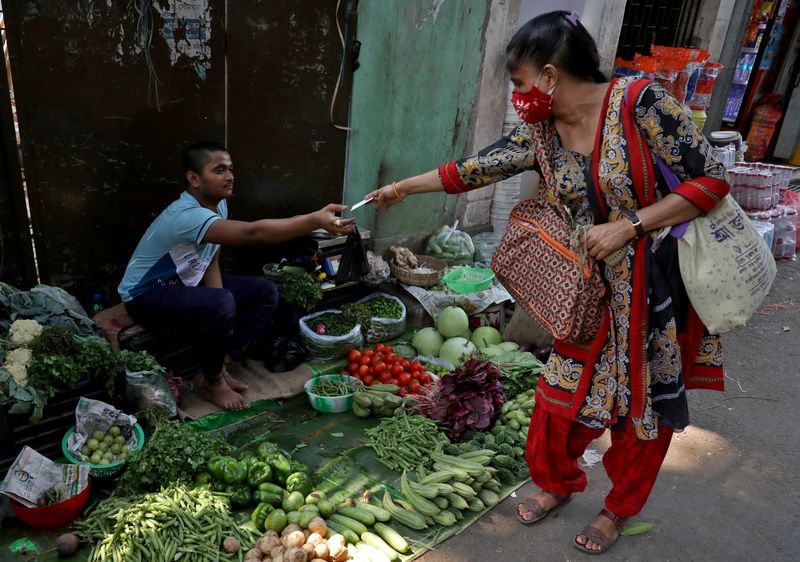 Analysis-India looks to rains, not just rates, to cool hot inflation