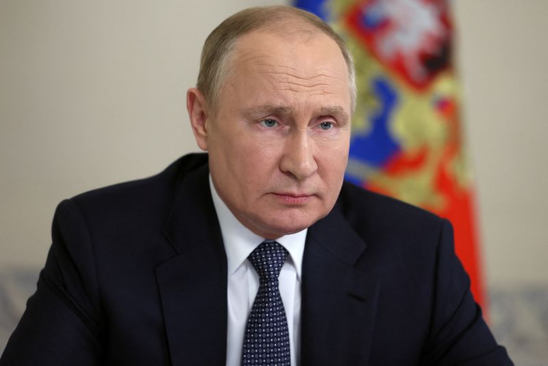Putin signs decree on external debt service as possible default looms