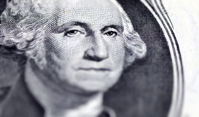 Dollar near 3-week low as Fed's Powell less hawkish than feared