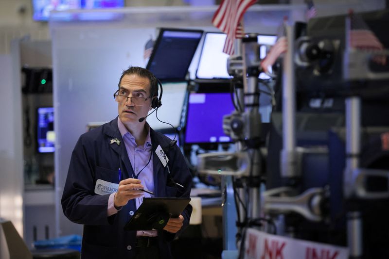 Wall Street falls as solid jobs data fuels rate hike worries