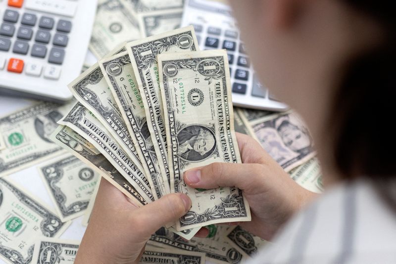 Dollar stands tall as focus swings back to Fed