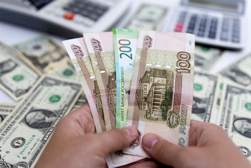 Rouble surges, stocks fall as Russia holds Ukraine referendums