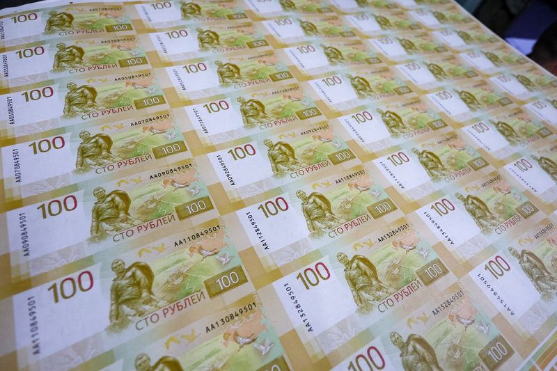 Rouble firms past 61 vs dollar to 2-week high on tax payments support