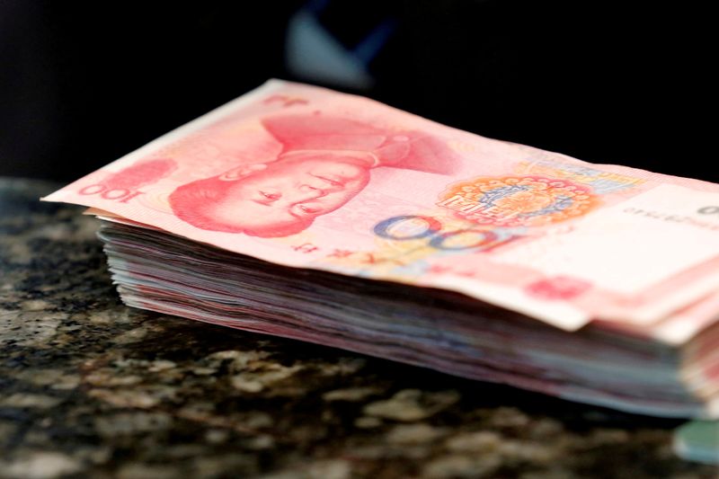 Exclusive-China FX regulator surveys banks about positioning as yuan plunges - sources