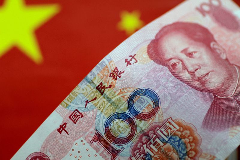 China's yuan briefly hits 1-1/2-week high then sinks into the red