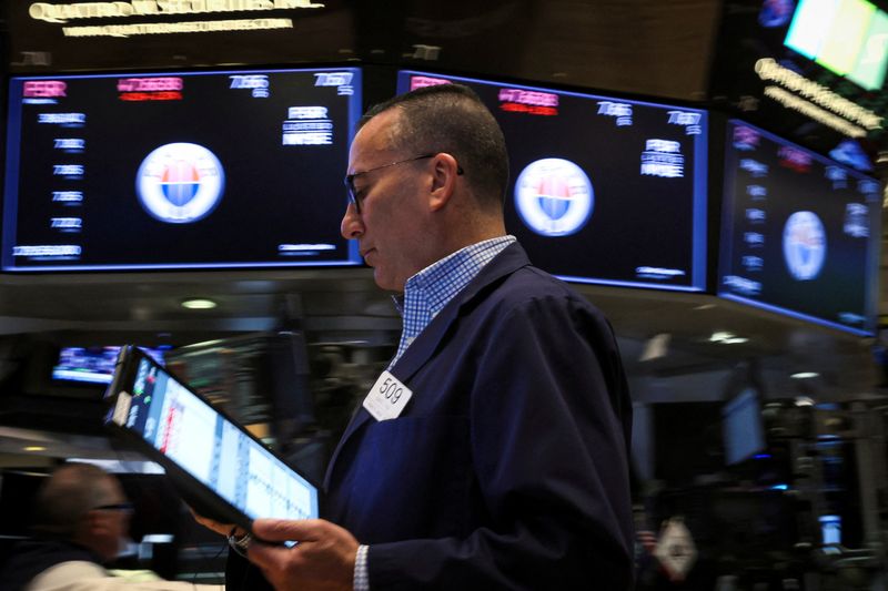 Wall St opens lower ahead of Fed minutes, Apple falls
