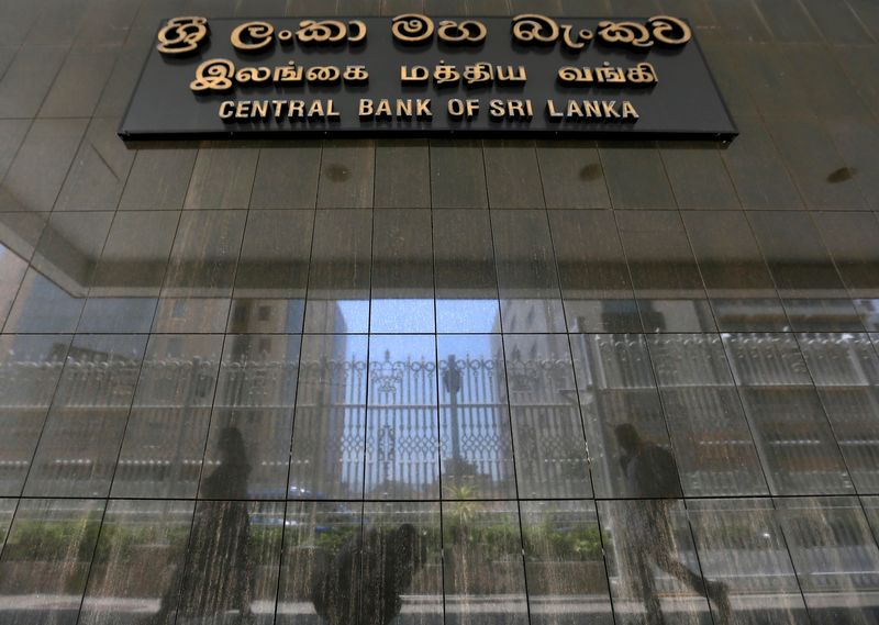 Sri Lanka central bank holds rates steady, says mkt interest rates must fall