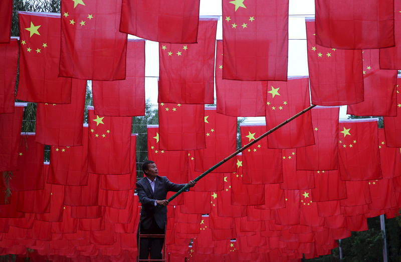Chinese stocks plummet, yuan slides amid COVID protests