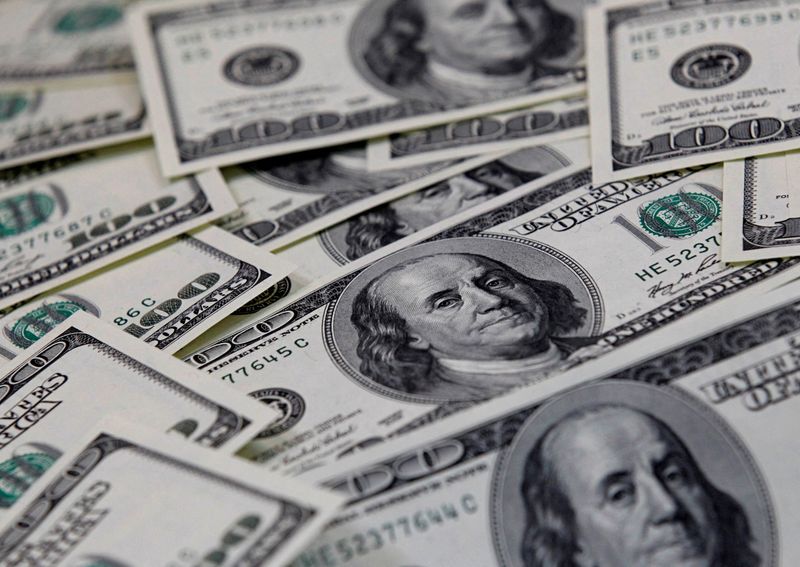 Dollar near one-week high as traders prepare for Powell, payrolls tests