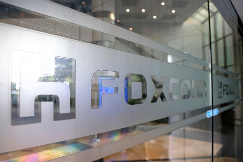 Apple supplier Foxconn pushed China to ease COVID curbs - WSJ