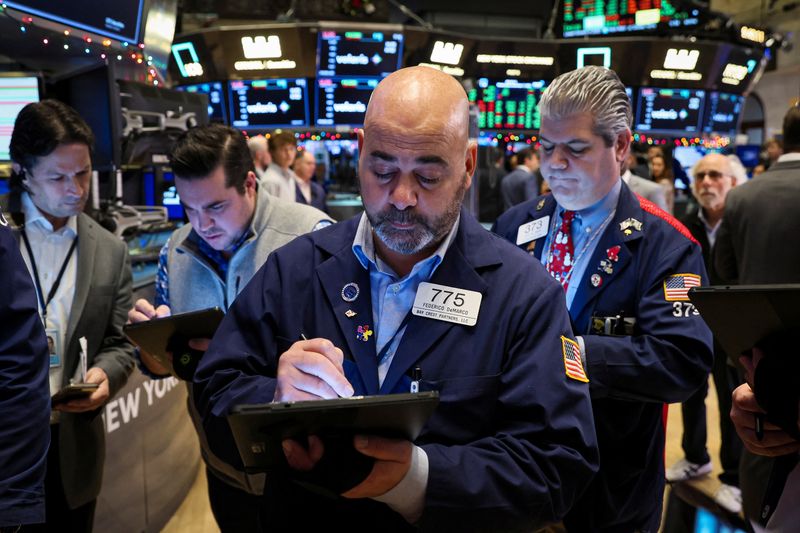 Wall St set for higher open as investors await CPI data, Fed decision