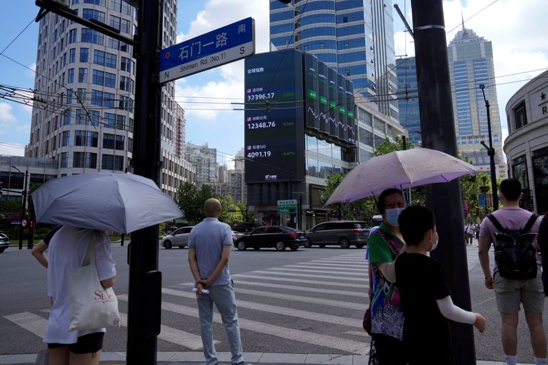 Wall Street ends green, dollar dips, Treasury yields rise on BOJ policy shift