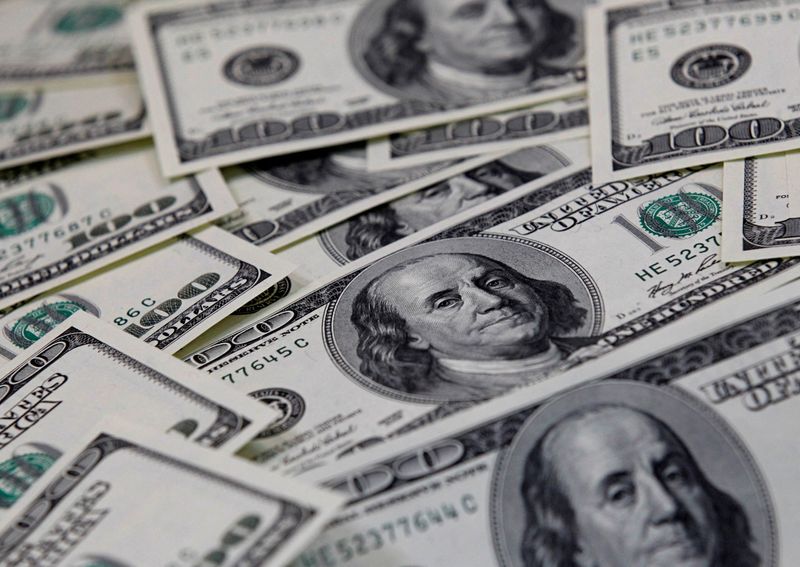 U.S. dollar slips, still set for biggest annual gain since 2015