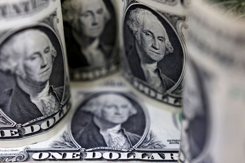 Dollar hits 7-month low vs euro on expectations of slower Fed hikes