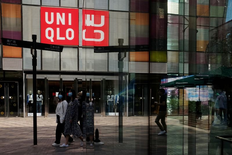 Japan's Fast Retailing to raise wages as much as 40%