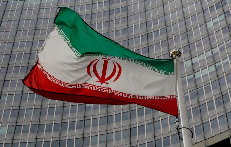 Iran says U.S. to lift oil sanctions, Germany, France cautious on matter