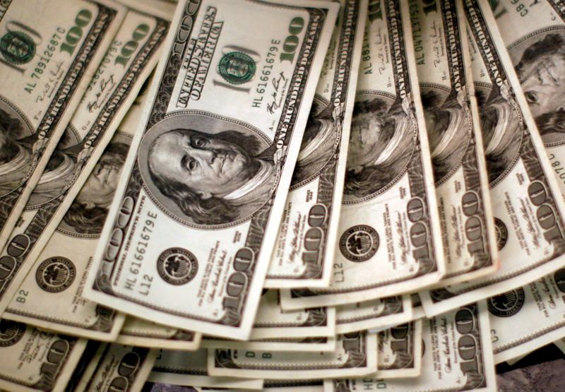 Dollar pauses as rate hike fears ebb, Fed minutes up next