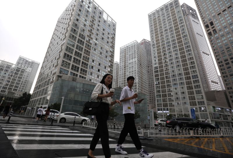 China says it will continue to open up financial sector