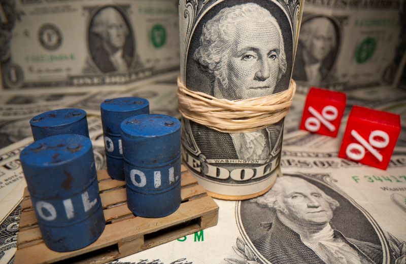 Oil slides as COVID-19 surge, firmer dollar overshadow U.S. crude drawdown