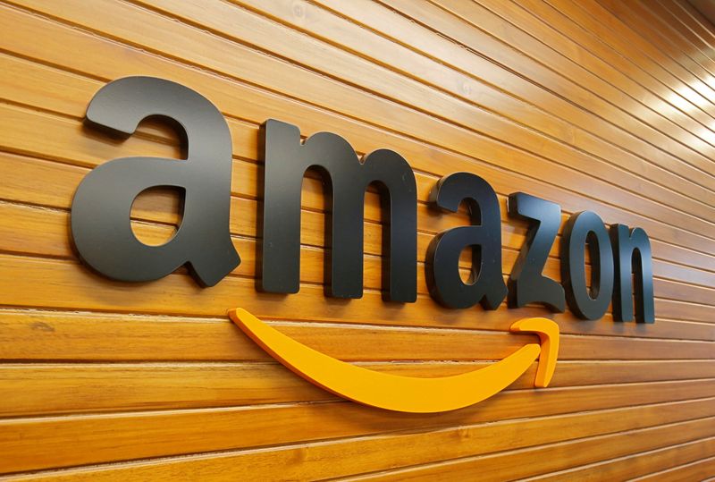 Amazon boosts hourly pay to over $18, to hire 125,000 workers