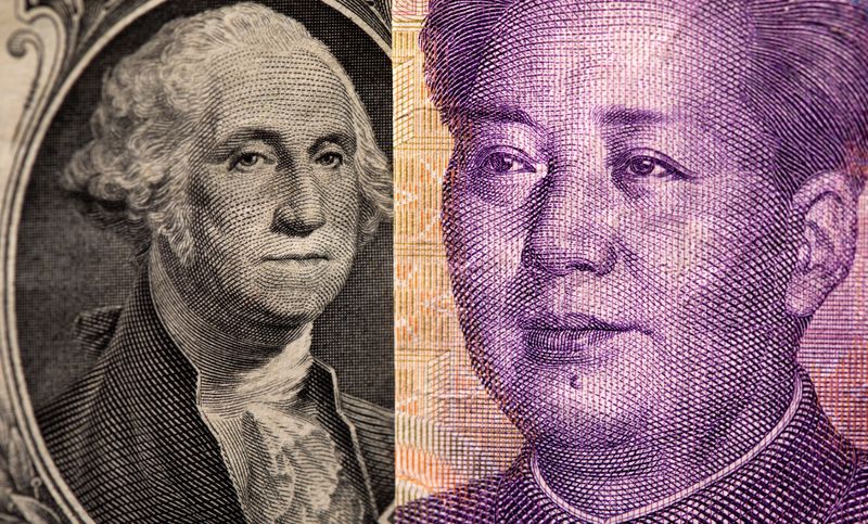 Dollar holds gains, yuan under pressure as Evergrande risks grow