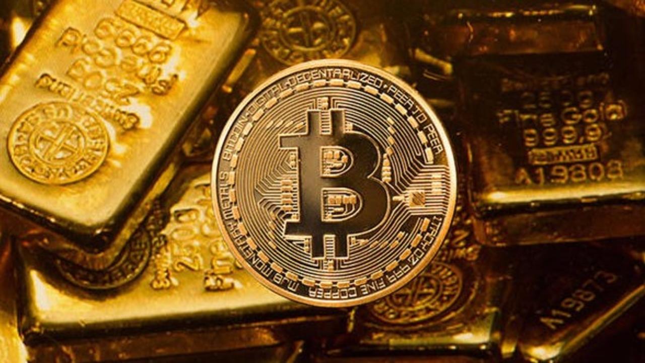 Các nhà phân thích đổ lỗi cho sự sụt giảm của vàng là do Bitcoin